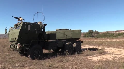 U.S. Marines M142 High Mobility Artillery Rocket System rotating Stock Footage 257891891