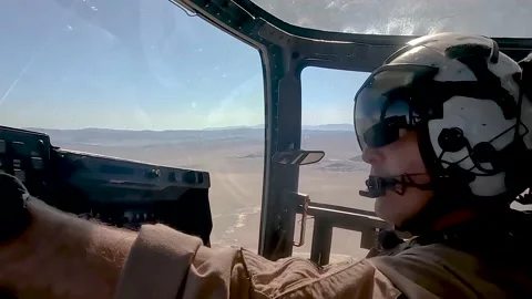 U.S. Marines MV-22 Osprey pilot adjusting cockpit controls during flight Stock Footage 232393919