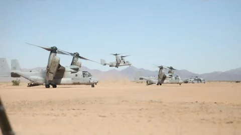 U.S. Marines MV-22 Osprey landing in desert Stock Footage 334835328