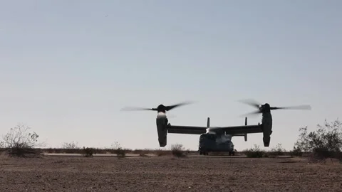 U.S. Marines MV-22B Osprey groundrunning in the desert Stock Footage 257553665