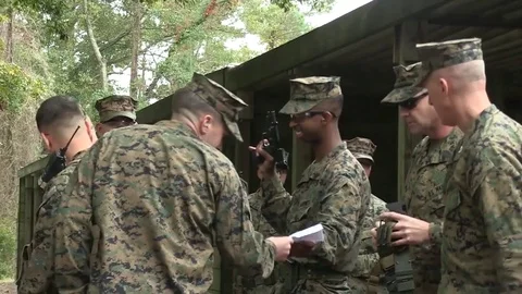 U.S. Marines registering for combat pistol training program at Camp Lejeune Stock Footage 82300146