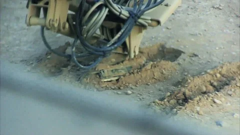U.S. Marines with Route Clearance Platoon, 2nd CEB dig and find an IED - 2011 Stock Footage 106046248