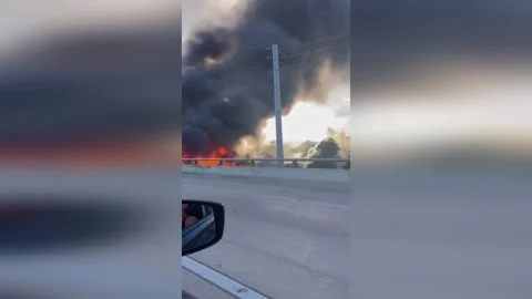 US: Massive Blaze Engulfs Abandoned Rodeway Inn Near University Of Texas Stock Footage 320813594