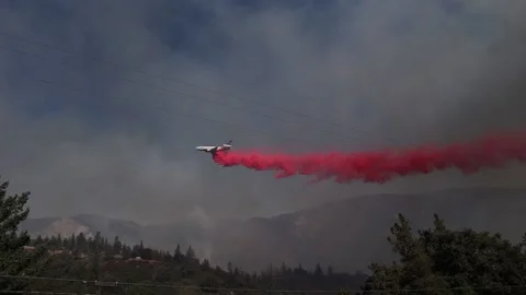 US: Massive Jet Douses Flames as Line Fire Ravages 20,553 Acres in San Berna... Stock Footage 286898133