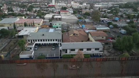 US-Mexico Border Aerials in Tecate California and Tecate Mexico Stock Footage 153059146