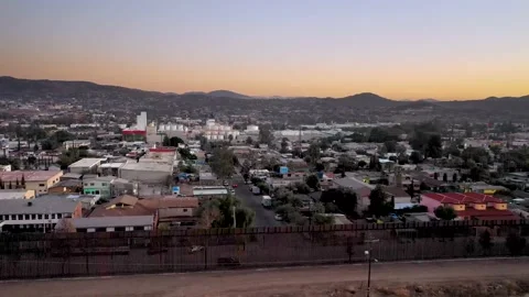 US-Mexico Border Aerials in Tecate California and Tecate Mexico Stock Footage 153059156