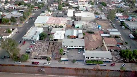 US-Mexico Border Aerials in Tecate California and Tecate Mexico Stock Footage 153059158