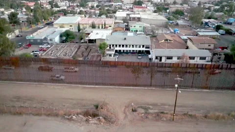 US-Mexico Border Aerials in Tecate California and Tecate Mexico Stock Footage 153059166