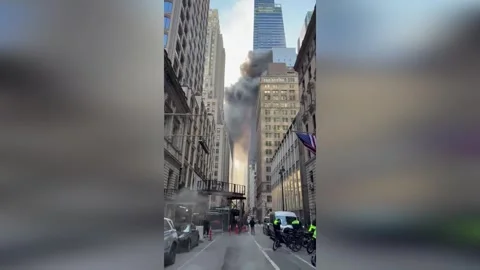 US: Midtown Manhattan Rooftop Fire Erupts Near St. Patricks Day Parade R... Stock-Footage 330982013