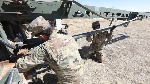 U.S. military engineers assembling RQ-7 Shadow unmanned aircraft prior to launch Stock Footage 87123073