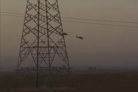 U.S. military forces secure area, Iraq civilians strolling near fields - 2001 Stock Footage 102865760