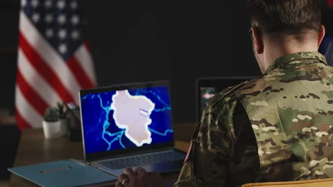 U.S. military planning operation using intelligence and digital map on laptops Stock Footage 334669218