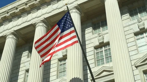 US National Flag on facade of US Department of Commerce 스톡 동영상 72054477