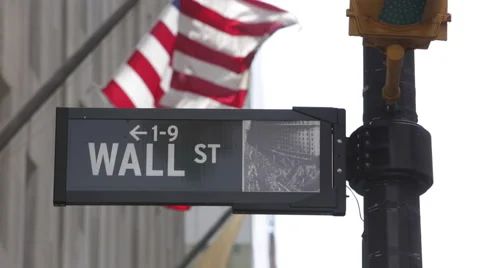 U.S. national flag waves at Wall Street in New York Stock Footage 50522364