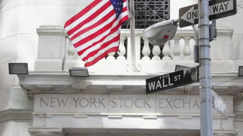 U.S. national flags wave at the New York Stock Exchange at the Wall Street Stock Footage 50522384