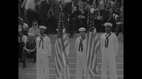 US Navy cadets standing with flags at Lincoln Memorial during Civil Rights March Stock Footage