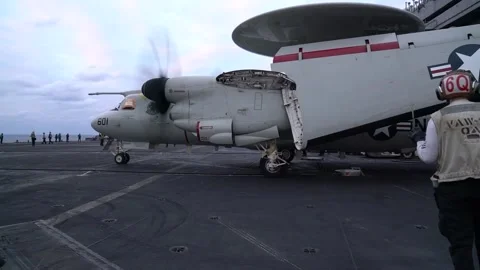 U.S. Navy E-2D Advanced Hawkeye taxiing aboard USS Carl Vinson CVN 70 Stock Footage 297744298