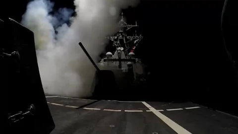 U.S. Navy guided-missile destroyer launches Tomahawk missile at Houthi targets Stock Footage 263720804