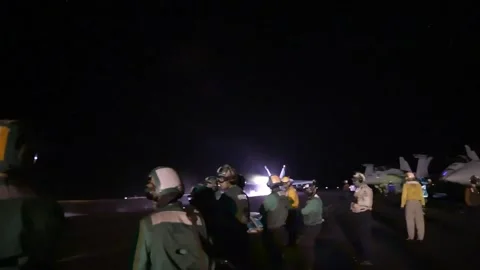 U.S. Navy launch F/A-18 Hornet from USS Dwight D. Eisenhower to target Houthis Stock Footage 263723093