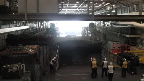 U.S. Navy LCAC inflating and departing from well deck of USS New York LPD 21 Stock Footage 273476524