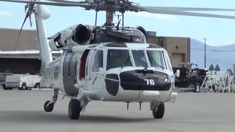 U.S. Navy MH-60 Seahawk with white paintwork taxiing at NAS Fallon Stock Footage 275824243