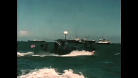 The U.S. Navy Mine Sweeping Boat sweeps the waters of the Long Tau River during Stock Footage