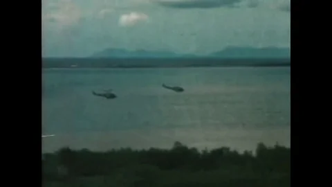 The U.S. Navy River Patrol Boats go out for night patrol in the Rung Sat near Stock Footage