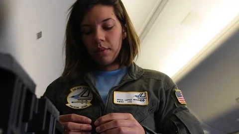 U.S. Navy sailor setting digital device onboard P-8 Poseidon Vídeos de archivo 110732296