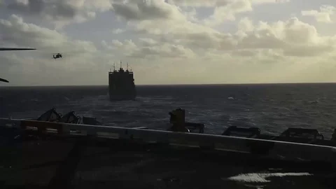 US Navy Seahawk approaching USS Theodore Roosevelt Stock Footage 81660509