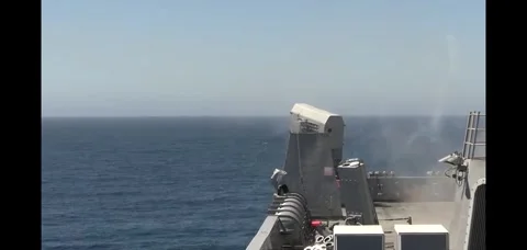 U.S. Navy ship USS San Diego (LPD 22) firing RIM-116 rolling airframe missile Stock Footage 282433850