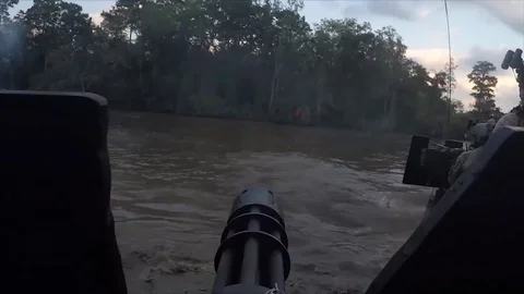 US Navy Special Warfare. First person machine gun shooting Stock Footage 121890497