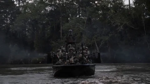 US Navy Special Warfare. Machine Gunner Shoots. Slow motion Stock Footage 121890296