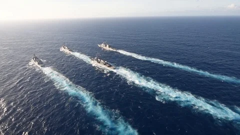 US Navy strike group guided-missile destroyers and cruiser sail Philippine Sea Video stock 87126716