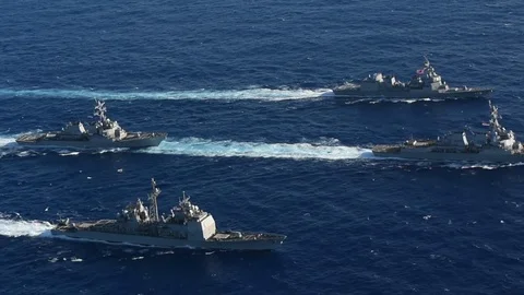 US Navy strike group guided-missile destroyers and cruiser sail Philippine Sea Video stock 87127014