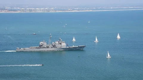 US Navy Ticonderoga-class Cruiser and Sailboats off Coronado Island Stock Footage 113014510