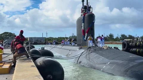 U.S. Navy Virginia-class submarine USS Minnesota docking at U.S. Naval Base Guam Stock Footage 293567538