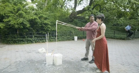 US - NYC - Central Park Bubbles 7 Stock Footage 126891647