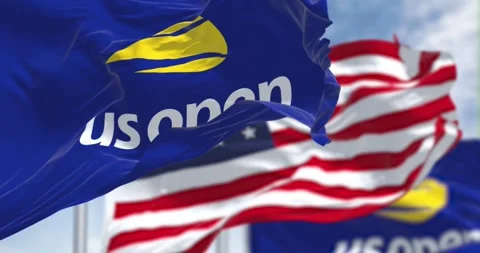 Us Open and the american flags waving on a clear day Stock-Footage 246746235