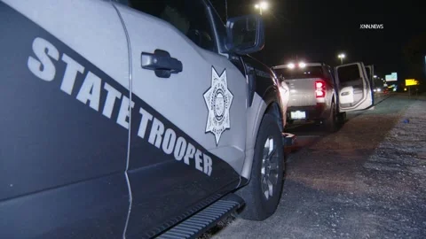 US, Phoenix: Peoria Trooper Stops Loop 101 DUI Wrong-Way Driver With Grap... Stock Footage 327901009