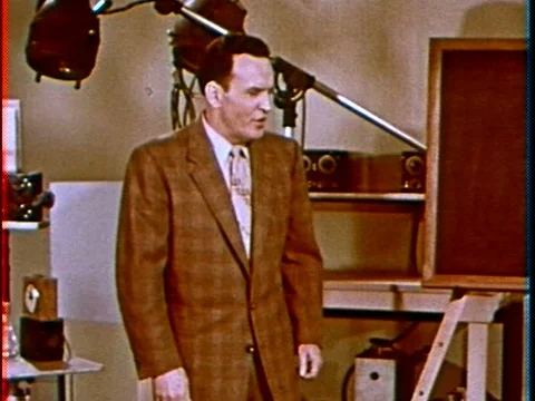 A U.S. physicist gives an overview explanation on Einstein's theory of Stock Footage 75304482