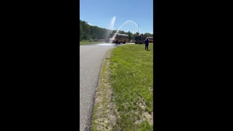 US: Pines Fire Department Sends Students Off To Summer Under Engine Water... Stock Footage 336295797