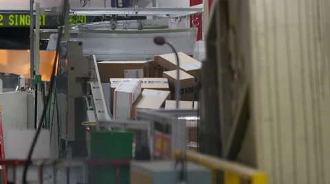 US post office packages on a conveyor belt Video stock 58239527