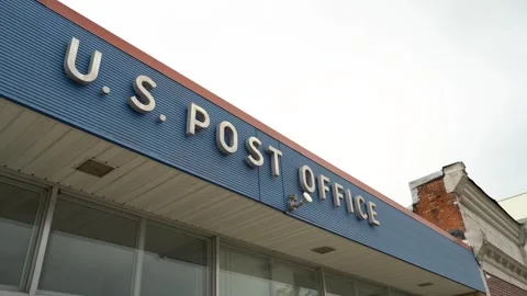 US Post Office United States postal service 4k exterior building sign Stock Footage 242659620
