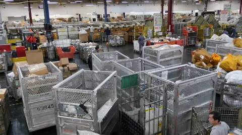 US Post office wide shot mail sorting Video stock 58238099