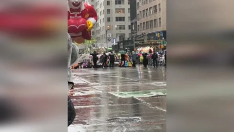 US: Protesters Storm Macy's Parade, Disrupting Iconic Midtown Event Stock Footage 294354505