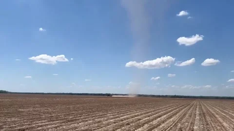 US: Rare Dust Devil Outbreak Spins Across Arkansas Field Near Highway 65 Stock Footage 332517476
