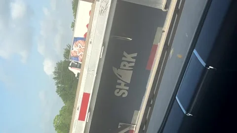 US: Rat Spotted Running on Flatbed Trailer While Driving on Highway Stock Footage 326339321