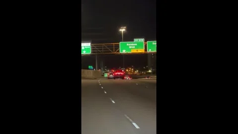 US: Reckless driver swerves across lanes and hits barrier in Las Vegas, U... Video stock 323487003