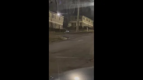 US: Robot dog spotted walking along street in Atlanta, Georgia, USA Stock Footage 330250760