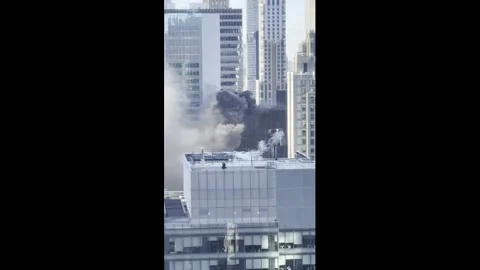 US: Rooftop Fire Breaks Out Near NYC St. Patricks Day Parade in Midtown ... Stock-Footage 331047771
